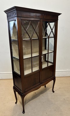 Lot 1202 - An Edwardian mahogany display cabinet, with...