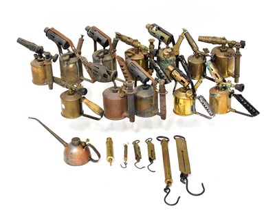 Lot 349 - A quantity of vintage brass blow lamps to...