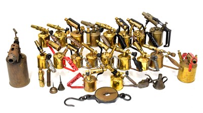 Lot 351 - A quantity of vintage brass blow lamps to...
