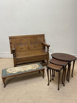 Lot 1164 - A 1950s carved oak monk's bench, width 105cm,...