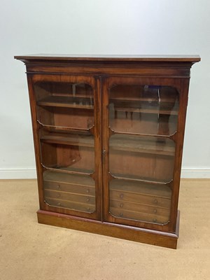 Lot 603 - A mahogany glazed cabinet with six internal...