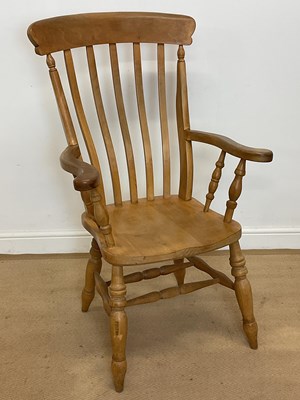 Lot 656 - A high bar back, kitchen Windsor beech elbow...