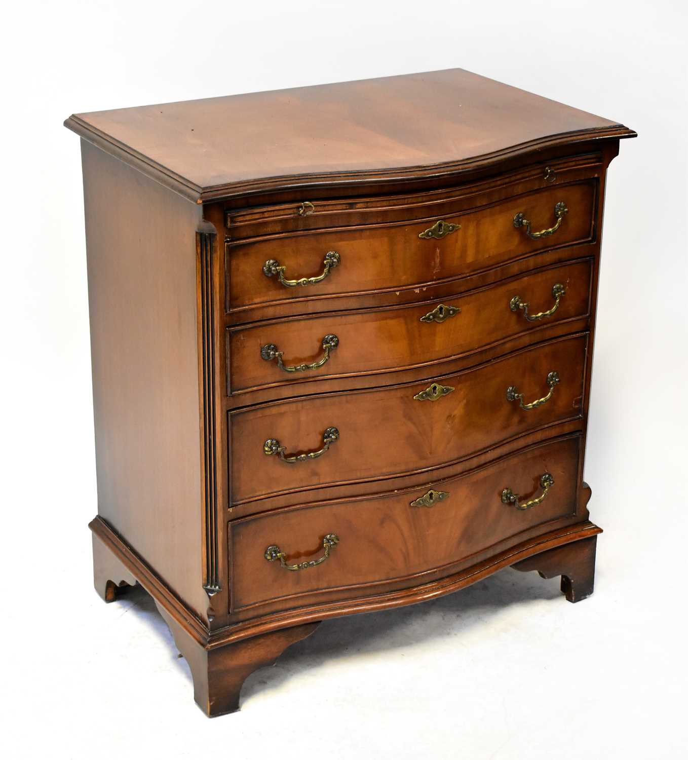 Lot 39 - A reproduction mahogany bow-front chest of...