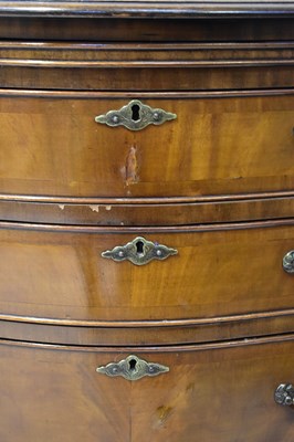 Lot 39 - A reproduction mahogany bow-front chest of...
