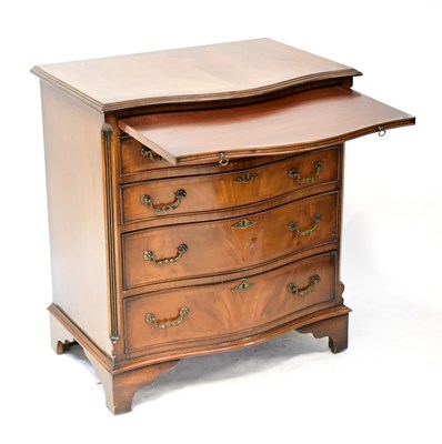 Lot 39 - A reproduction mahogany bow-front chest of...