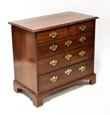 Lot 43 - A George III oak chest of two short over three...