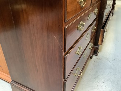 Lot 43 - A George III oak chest of two short over three...