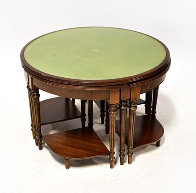 Lot 27 - A modern nest of five tables, the central...