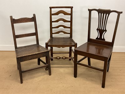 Lot 657 - An elm ladder back chair, height 93cm,...