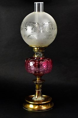 Lot 163 - A Victorian paraffin lamp with frosted glass...