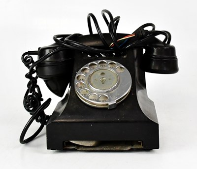 Lot 327 - A vintage black Bakelite telephone.