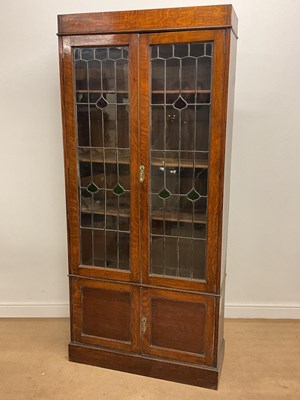 Lot 594 - An Art Nouveau glazed cabinet, height 192cm,...