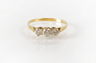 Lot 827 - A 9ct gold ring set with three diamonds in...