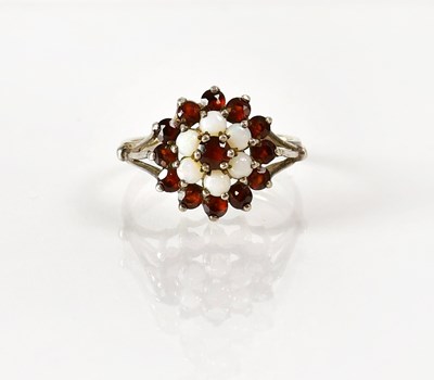 Lot 833 - A hallmarked silver cluster ring set with...
