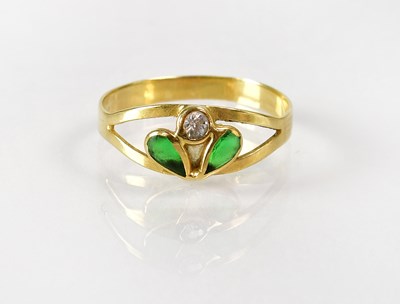 Lot 831 - A gold ring set with a pair of tear-shaped...