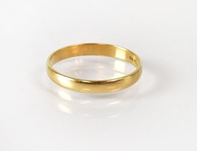 Lot 821 - A 15ct gold wedding band, width 3mm, marked 15,...
