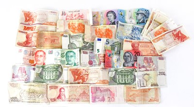 Lot 708 - A group of world banknotes, to include...