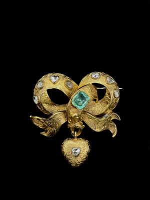 Lot 1236 - A Victorian yellow metal diamond and emerald...