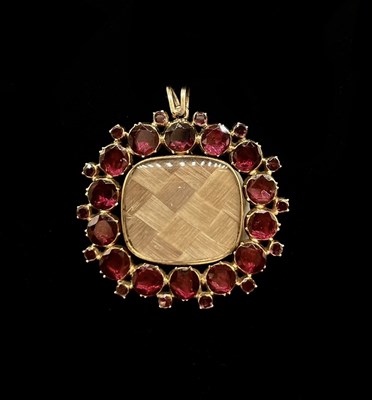 Lot 1237 - A Victorian yellow metal mourning pendant set...