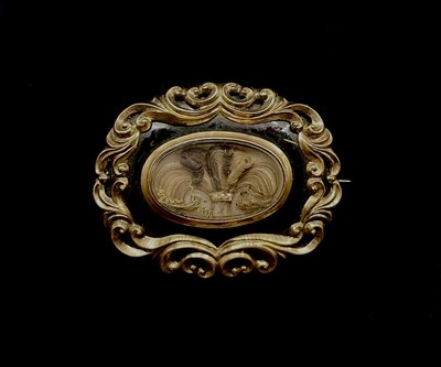 Lot 1239 - A large Victorian yellow metal black onyx and...