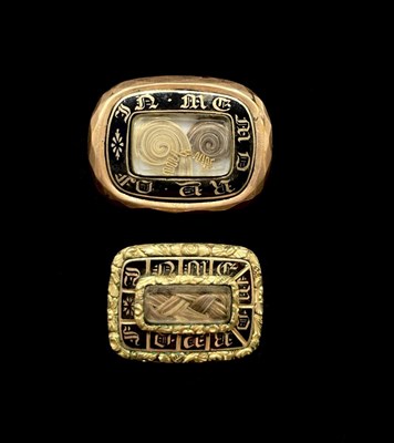 Lot 1242 - Two early Victorian yellow metal black enamel...