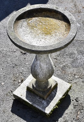 Lot 2701 - A reconstituted stone garden bird bath,...