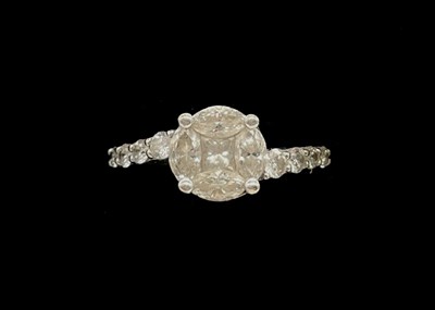 Lot 1228 - An 18ct white gold and diamond set ring, the...