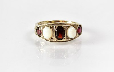 Lot 832 - A Victorian yellow metal ring set with two...