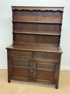 Lot 666 - An oak dresser, the base with two drawers...