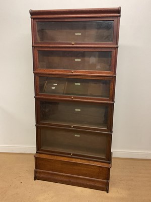 Lot 572 - A Globe Wernicke five section up and over book...