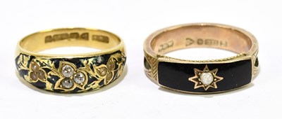 Lot 1070 - A 15ct yellow gold black enamel, diamond, and...