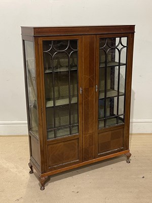 Lot 1207 - An Edwardian inlaid mahogany display cabinet,...