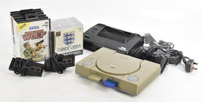 Lot 843 - SONY; a PlayStation 1 with associated...