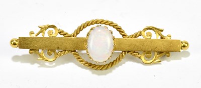Lot 1437 - A 15ct yellow gold and opal set bar brooch,...
