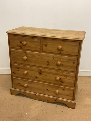 Lot 647 - A pine chest of two short over three long...