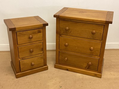 Lot 620 - A pine chest of three long drawers, height...