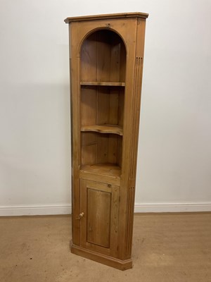 Lot 648 - A pine corner unit with two shelves and a...