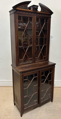 Lot 1152 - A late Victorian carved mahogany display...
