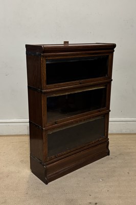 Lot 1199 - A Globe Wernicke style metal bound oak three...