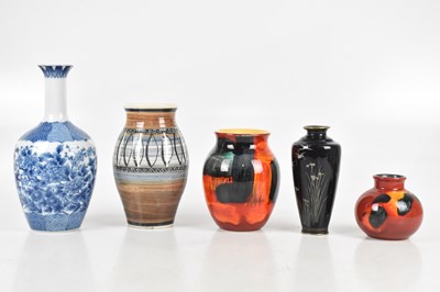 Lot 649 - Two Poole Pottery vases, a baluster vase...