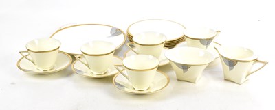 Lot 706 - ROYAL DOULTON; an Art Deco part tea service in...