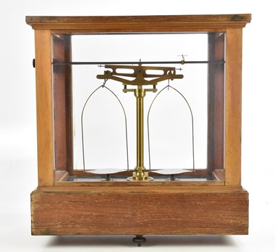 Lot 290 - OERTLING; a cased set of scientific scales,...