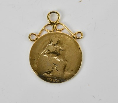 Lot 388 - A yellow metal pendant in the style of a...