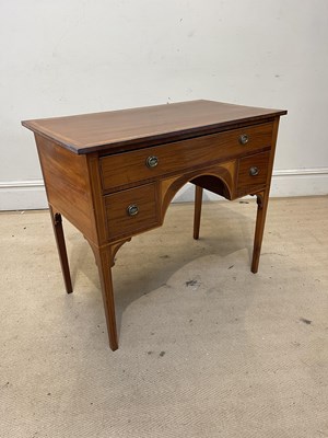 Lot 1211 - An Edwardian inlaid mahogany kneehole desk...