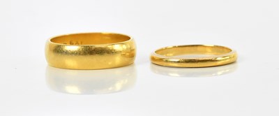 Lot 63 - Two 22ct yellow gold wedding bands, sizes P...