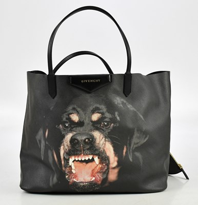 Lot 637 - GIVENCHY; a black coated canvas and calfskin...