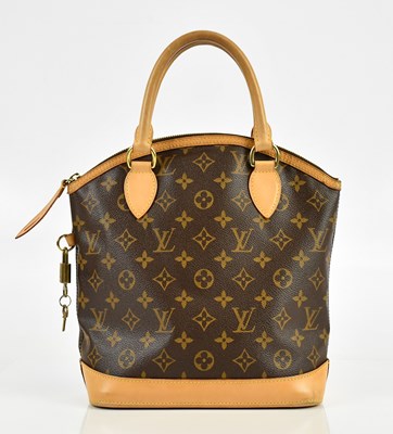 Lot 634 - LOUIS VUITTON; a brown monogram coated canvas...