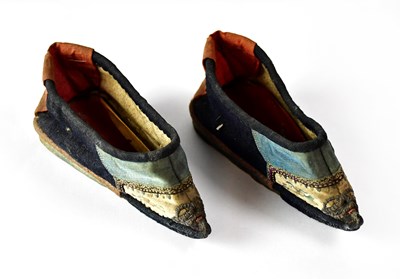 Lot 199 - A pair of Chinese pointed patchwork shoes,...