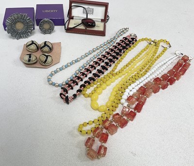 Lot 1224 - A small group of costume jewellery including...