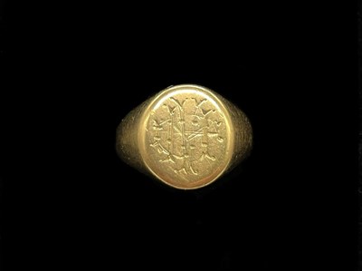 Lot 1265 - An 18ct yellow gold signet ring engraved with...